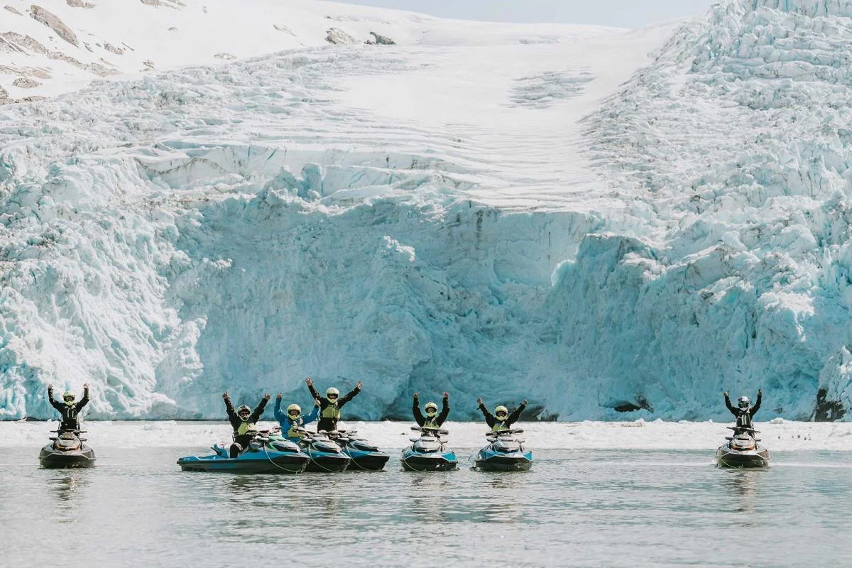 Group cheering at glacier