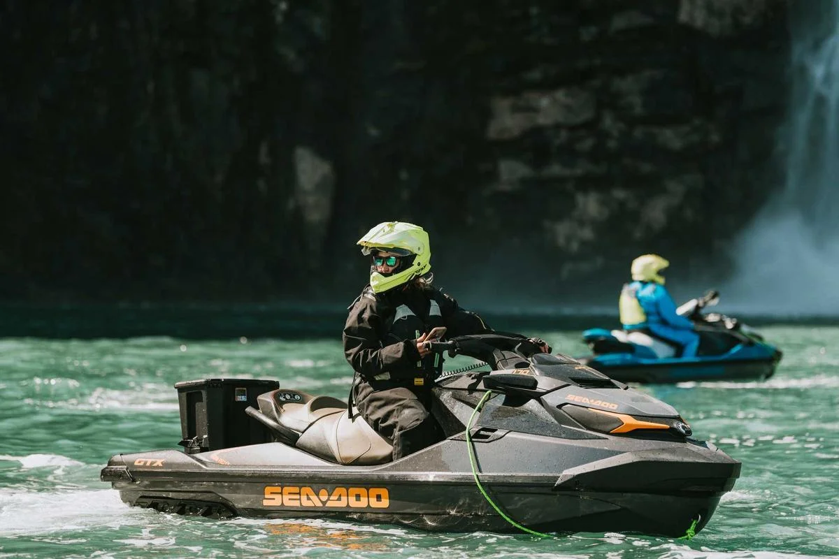 Jet ski looking at waterfall