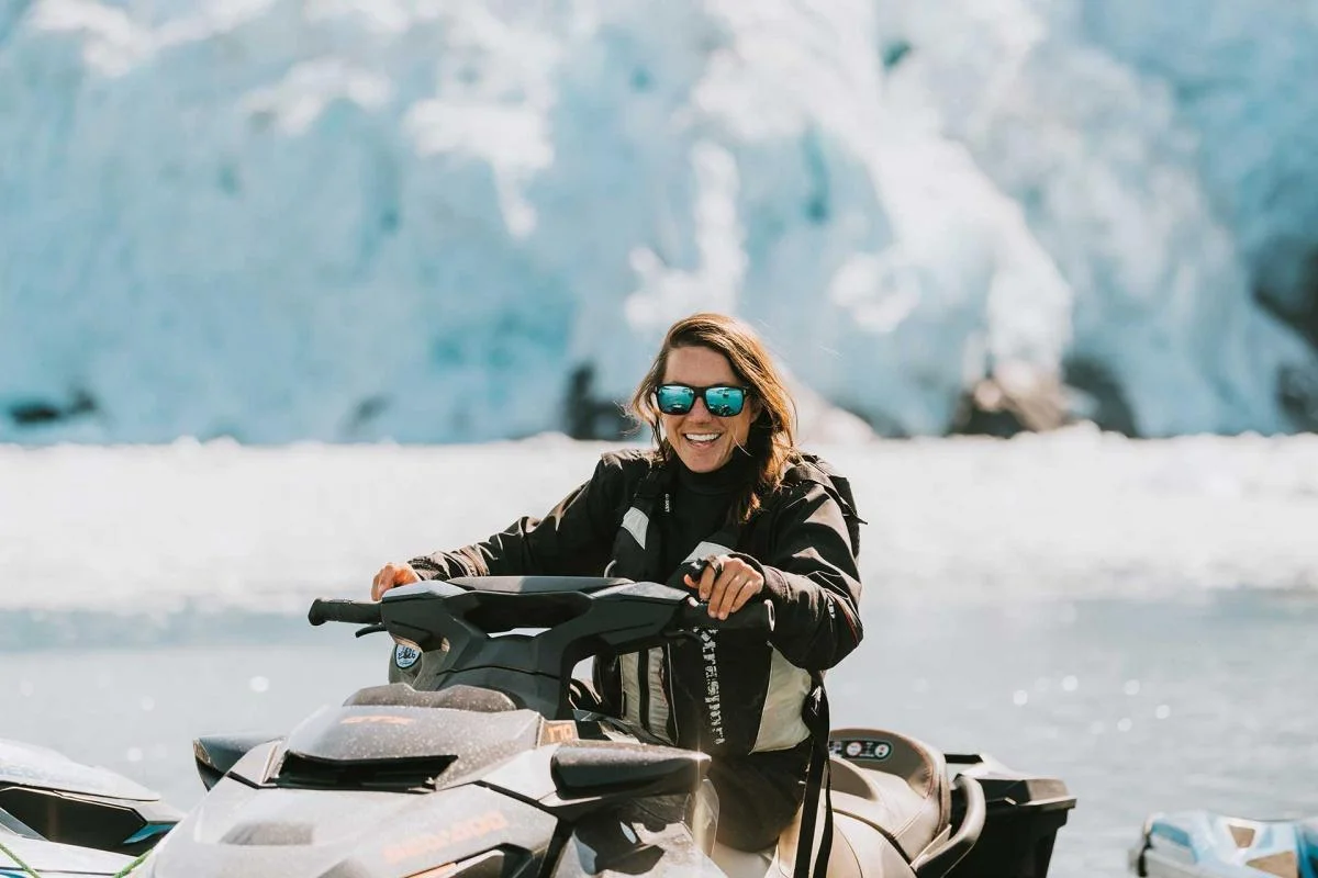 Guest smiling on jet ski